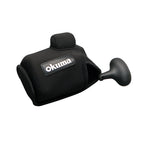 Black Reel cover with a matching black rubber strap and a visible Okuma brand patch on the front, shown on a plain white background.