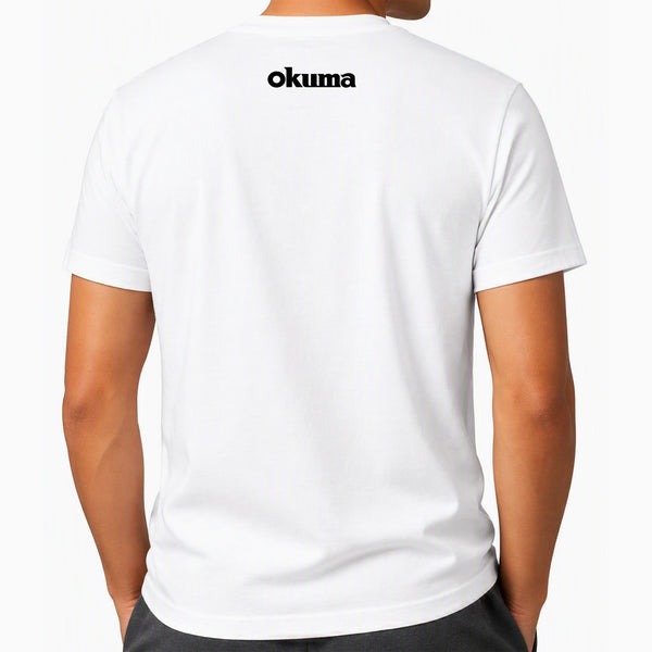 A man wearing a white short-sleeve t-shirt, viewed from the back. The brand name 'okuma' is printed in black sans-serif font on the upper center back.