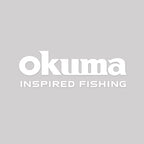 White Okuma Logo with light grey background